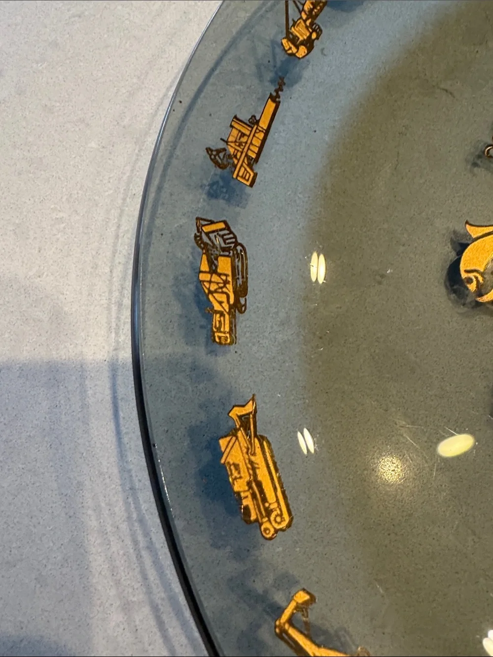 Glass Decorative Plate with Gold Zodiac Accents and heavy equipment